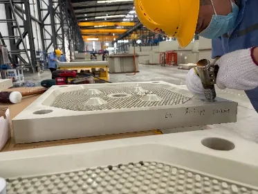Why Does a Filter Plate Feed Hole Get Blocked?